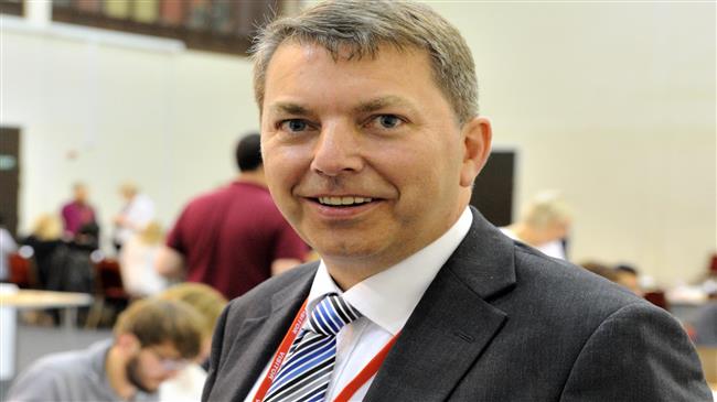 UK Conservative Party whip resigns over PM's Brexit deal