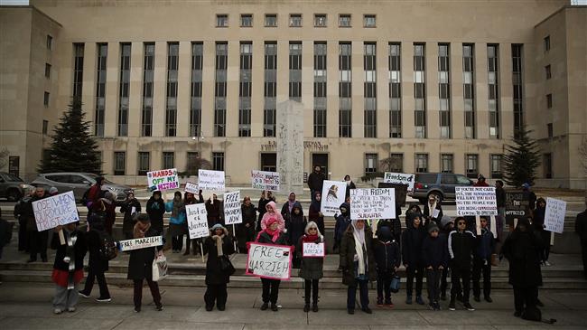Activists gather outside court, urge Hashemi’s release
