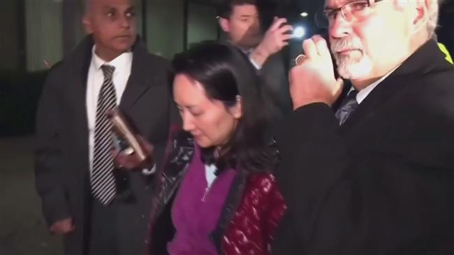 China protests charges against Huawei CFO