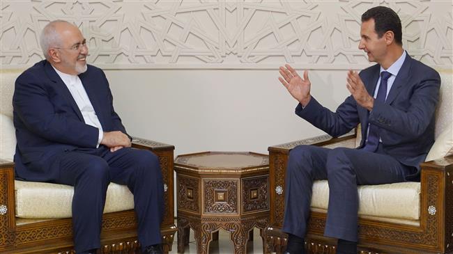 President Assad invites Iran’s Zarif to visit Damascus 