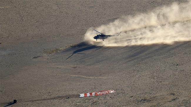 Military copter with 13 on board crashes in Kazakhstan