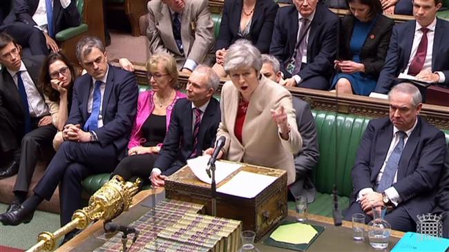 UK lawmakers reject Brexit deal for third time