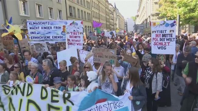60,000 protesters urge action against climate change