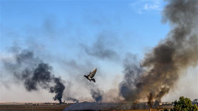Heavy fighting rages as Syrians flee Turkish attacks