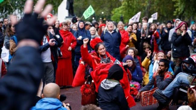Climate change activists target London's financial district