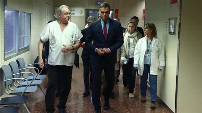 Spanish PM slams Catalonia chief in Barcelona visit
