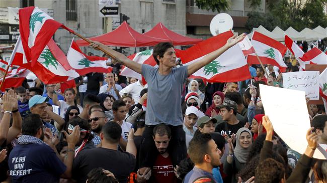Protests sweep Lebanon as fury at ruling elite grows