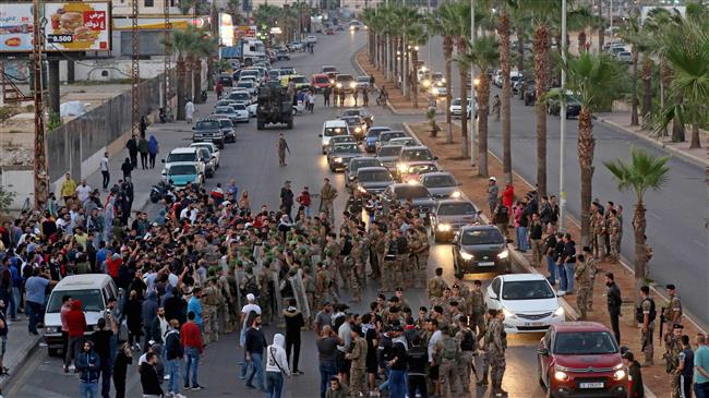 Protesters block roads as Lebanon reels under unrest 