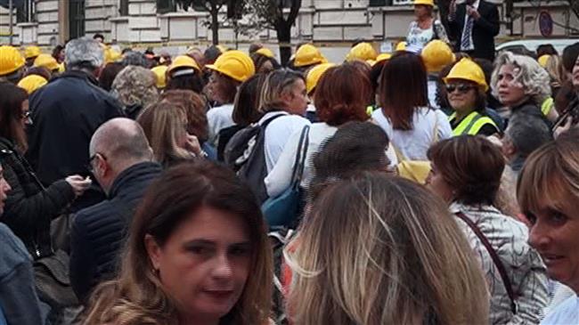Italy school officials hold rally lamenting poor safety