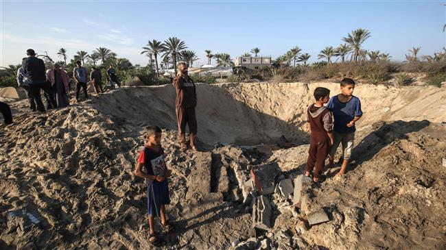 Hamas says downed drone as Israel threatens new war