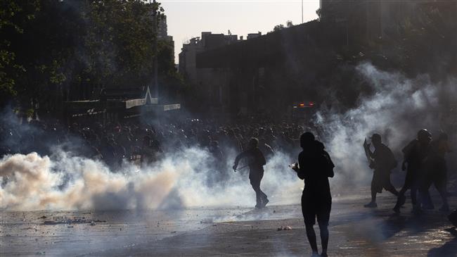 Tear gas, water cannons and violence in Chile demonstration