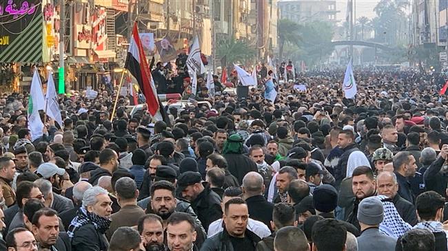 Huge crowds of Iraqis join funeral for Soleimani in Baghdad