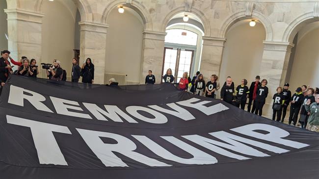 Protesters say 'remove Trump' as impeachment opens