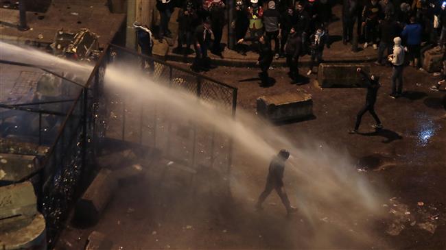 Lebanese police fire water cannons, tear gas at protesters 