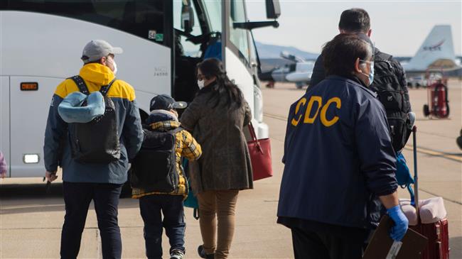 US prepares for coronavirus pandemic, school and business closures