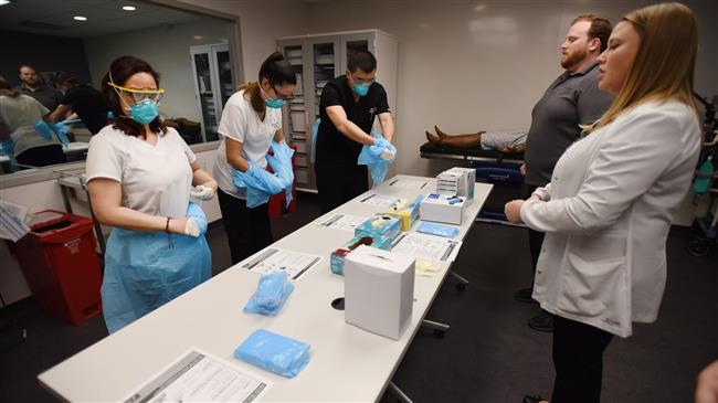 US top cancer hospital faces mask shortages as coronavirus cases show up in staff