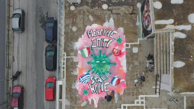 Teen graffiti artist paints COVID-19 inspired mural on Athens building