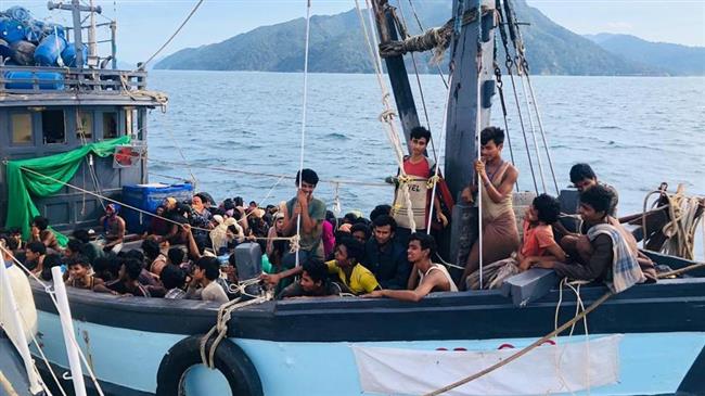 Malaysia detains boatload of over 200 Rohingya Muslim refugees   