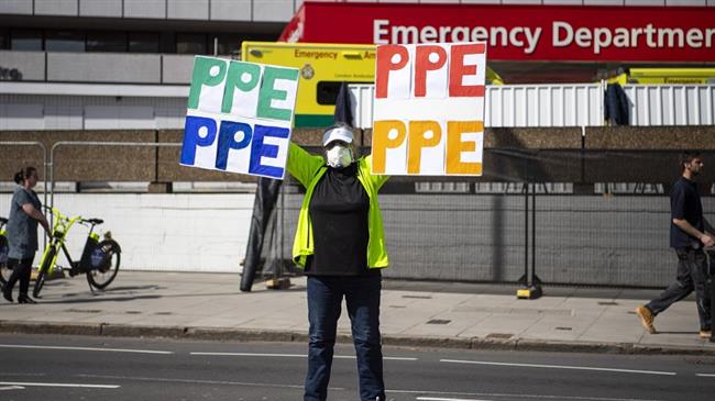 Leading doctor tells NHS staff not to waste PPE; causes outrage
