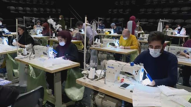 Iranian artists join charity mask production campaign to counter COVID-19