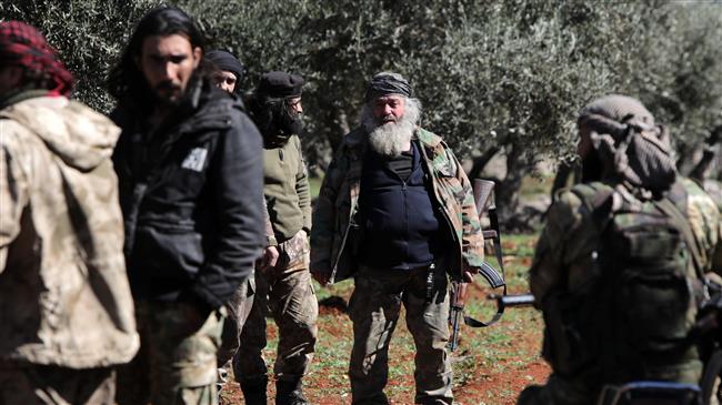 Turkish-backed Takfiri militants burn houses in NE Syria