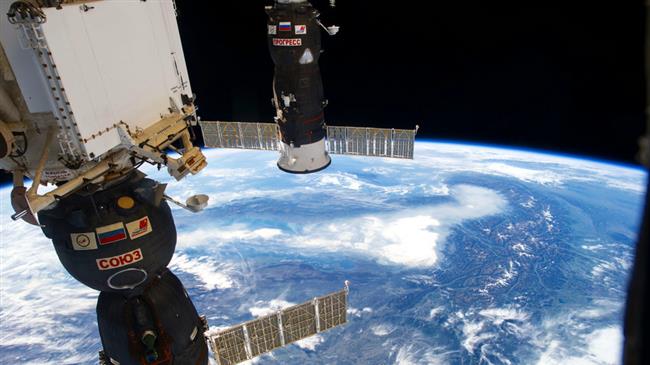 Progress resupply cargo ship docks with space station