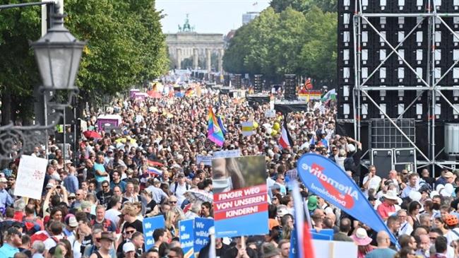 Tens of thousands protest coronavirus bans in Europe 
