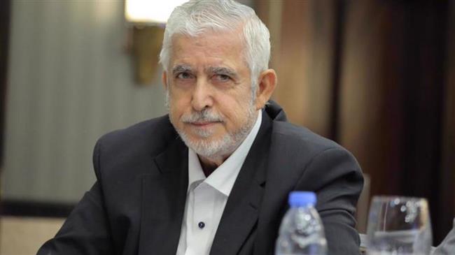 Amnesty urges Saudi king to drop charges against Hamas official, his son
