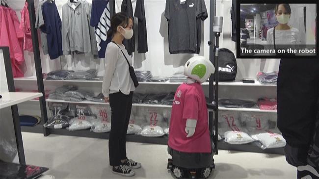 Robot reminds Japan shoppers to wear masks