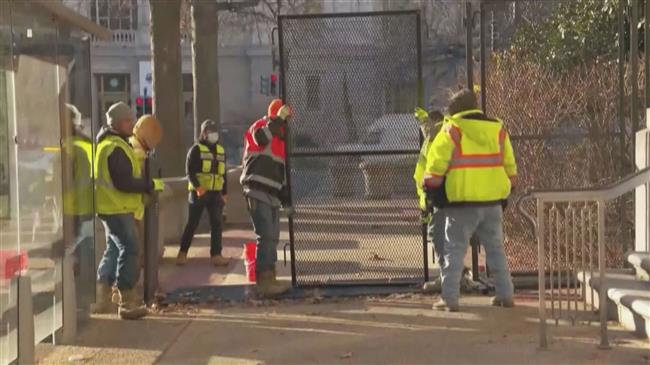 Security fencing comes down in US capital after Biden inauguration