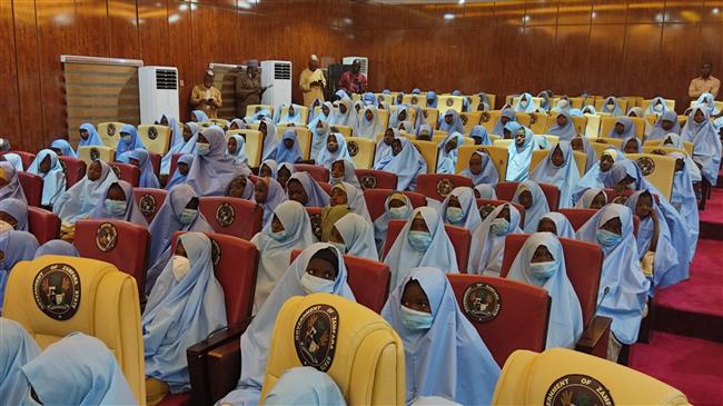 Nigerian schoolgirls leave state capital to reunite with families after kidnapping