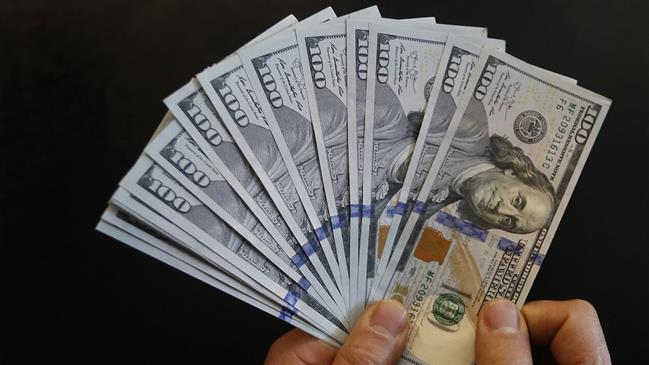 US dollar drops in Iran on reports about foreign funds
