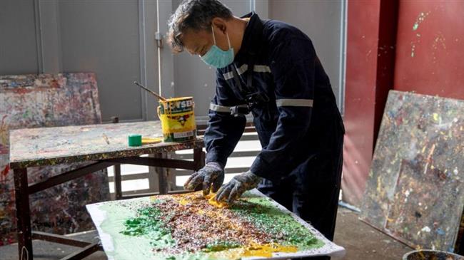 Trash into art: Filipino artist upcycles waste material into paintings