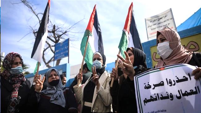 Palestinian refugees protest against UNRWA reductions of food coupons
