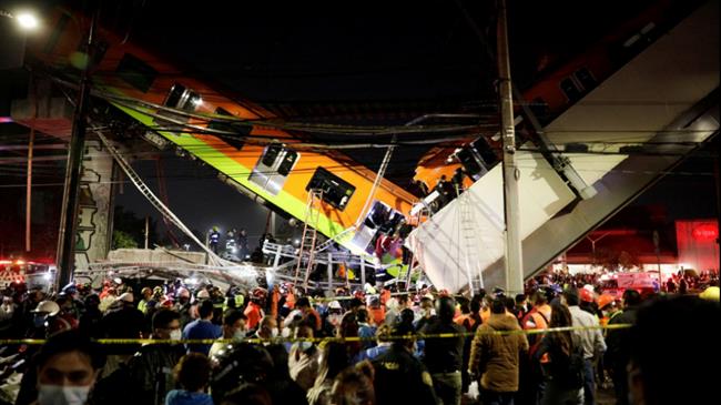 20 dead as Mexico City rail overpass collapses onto road