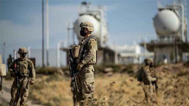 US convoy of 30 tankers crosses into Iraq with smuggled Syrian oil