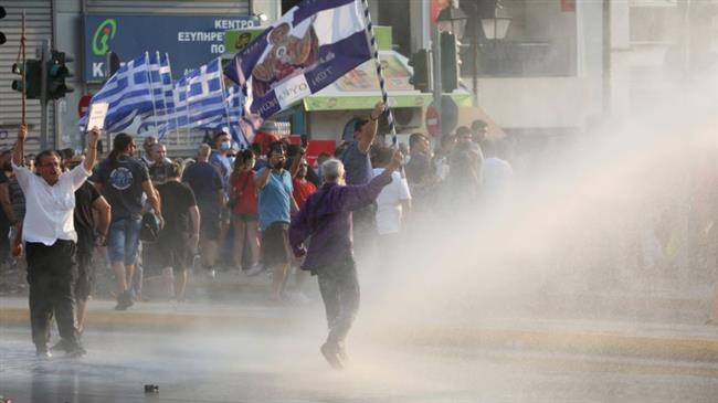 Greek police clash with anti-vaccine protesters in Athens