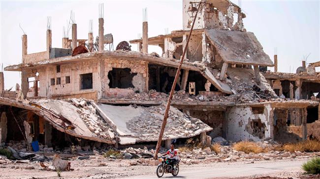 ‘Over 400 militants lay down arms in Dara’a after truce with Syrian army’